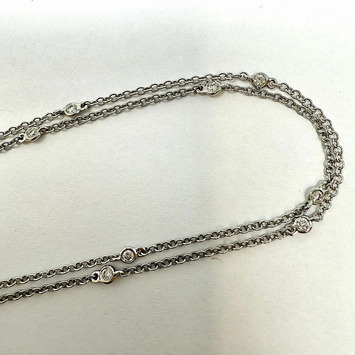 18K White Gold 16" Necklace with 13 Round Bezel Set Diamonds