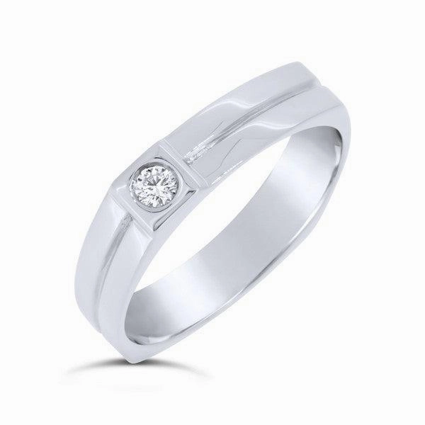 Alliance en or blanc sertie d'un diamant.