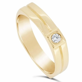 Alliance en or jaune sertie d'un diamant.