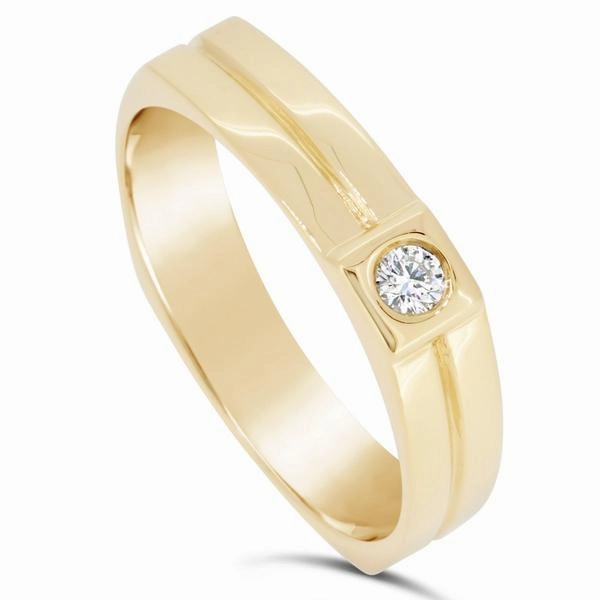 Alliance en or jaune sertie d'un diamant.