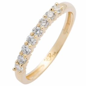 Alliance en or jaune sertie de diamants.