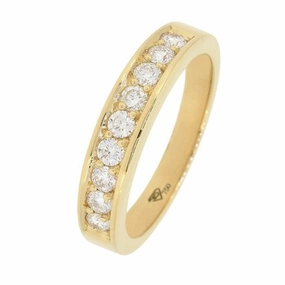Alliance en or jaune sertie de diamants.