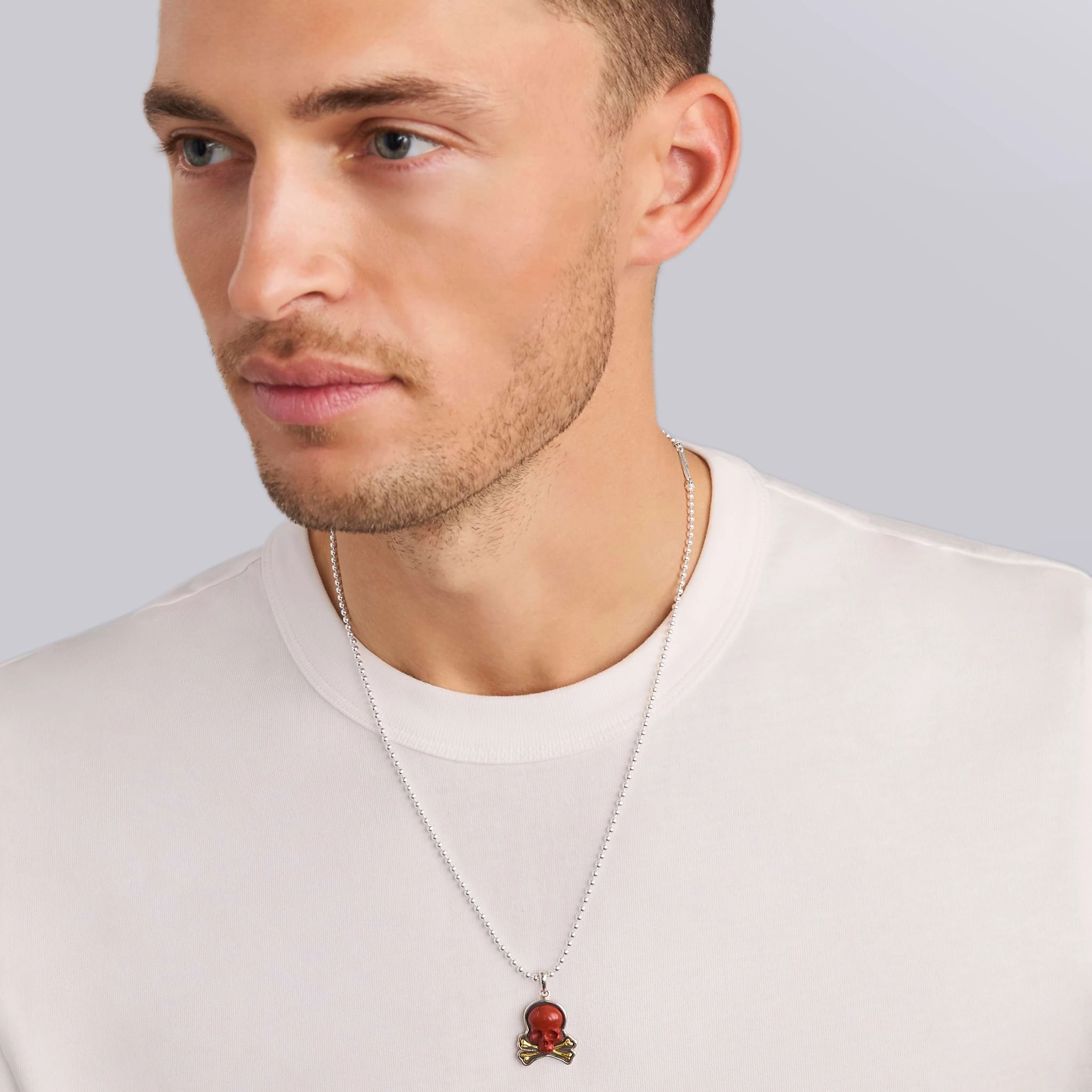 Anthem Two-Tone Red Jasper Skull and Bones Amulet