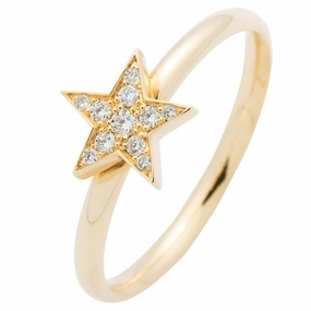 Bague ??toile en or jaune sertie de diamant.