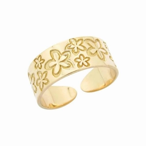 Bague de pied en or jaune. motifs fleurs.