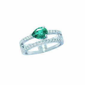 Bague en or blanc sertie de diamants et d'une emeraude de synth???se