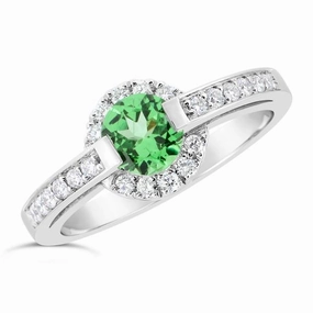 Bague en or blanc sertie de diamants et d'une tsavorite