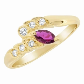 Bague en or jaune sertie d'un rubis et de diamants.