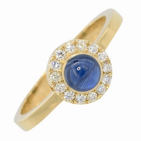 Bague en or jaune sertie d'un saphir et de diamants.