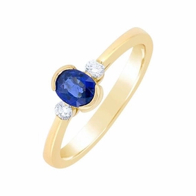 Bague en or jaune sertie d'un saphir et diamants.