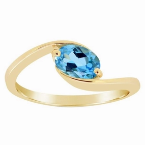 Bague en or jaune sertie d'une topaze