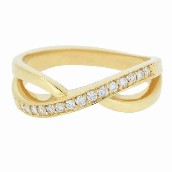 Bague en or jaune sertie de diamants.