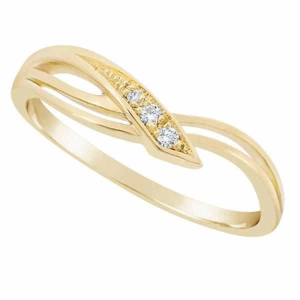 Bague en or jaune sertie de diamants.
