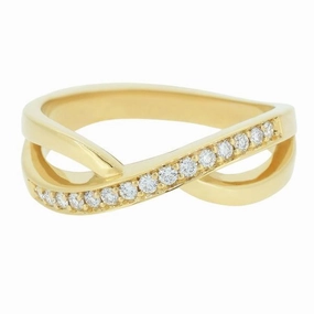 Bague en or jaune sertie de diamants.