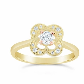 Bague en or jaune sertie de diamants.