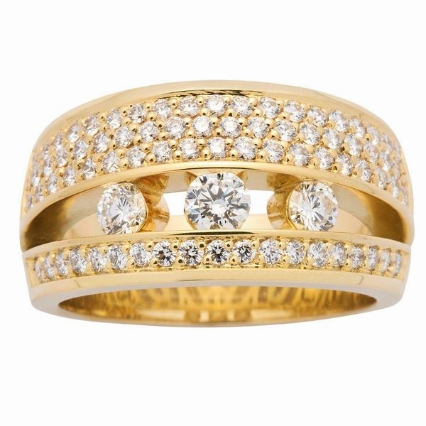 Bague en or jaune sertie de diamants.