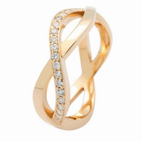 Bague en or jaune sertie de diamants.