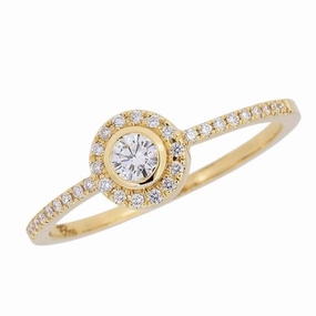 Bague en or jaune sertie de diamants.