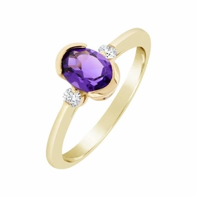 Bague en or jaune sertie de diamants et am??thyste 7x5