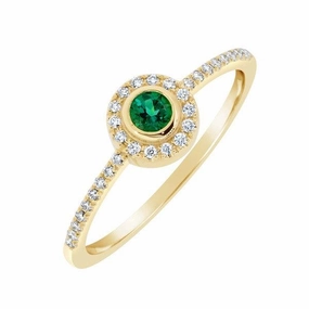 Bague en or jaune sertie de diamants et d'une emeraude de synth???se
