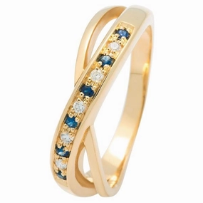 Bague en or jaune sertie de diamants et saphirs.