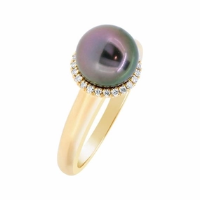 Bague en or jaune sertie de diamants et une perle de Tahiti 7/8.5 mm.