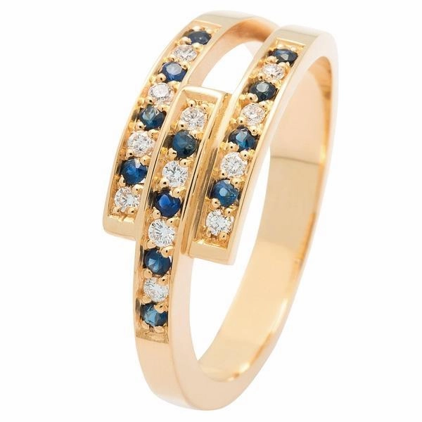 Bague en or jaune sertie de saphirs et de diamants.