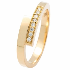 Bague en or jaune sertis de diamants.