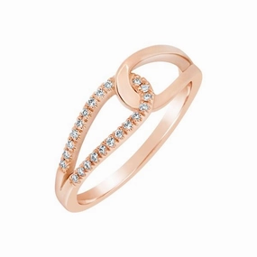 Bague en or rose sertie de diamants.