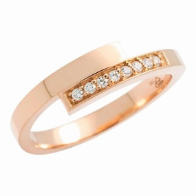 Bague en or rose sertie de diamants.