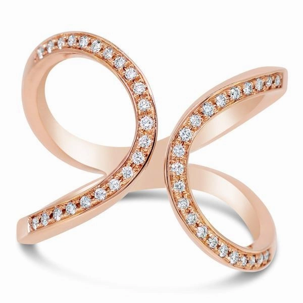 Bague en or rose sertie de diamants.