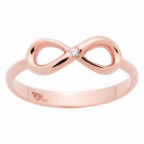 Bague infinity en or rose serti d'un diamant.