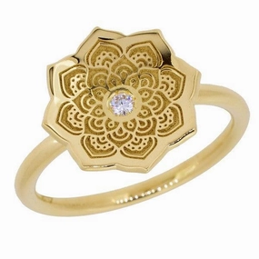 Bague mandala en or jaune sertie d'un diamant.