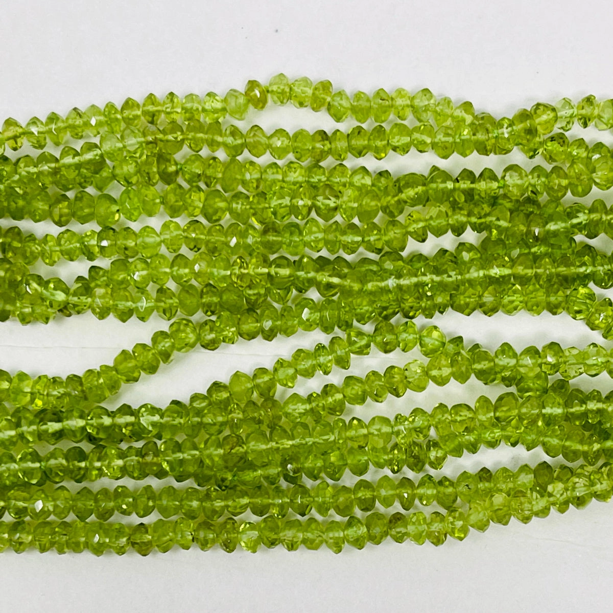 Hamilton & Inches 7 Strand Peridot Tassel Necklace with Diamonds (includes appra