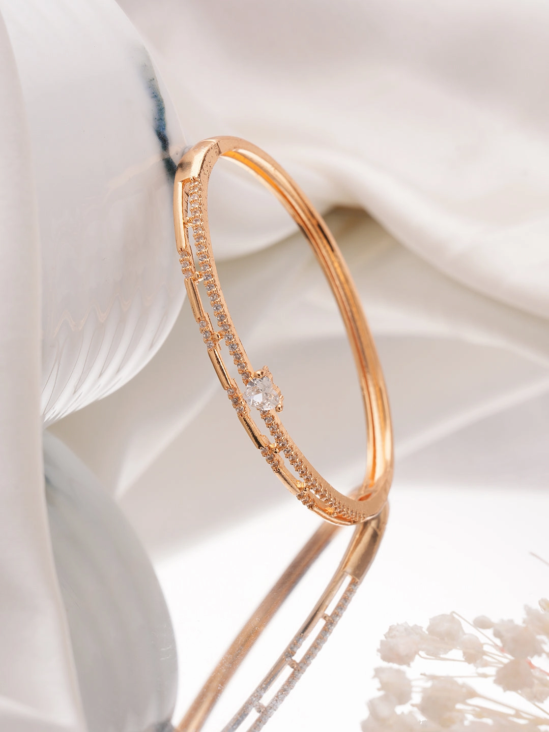 Jazz And Sizzle  Rose Gold-Plated Triangular Shaped AD studded Bangles type Bracelet