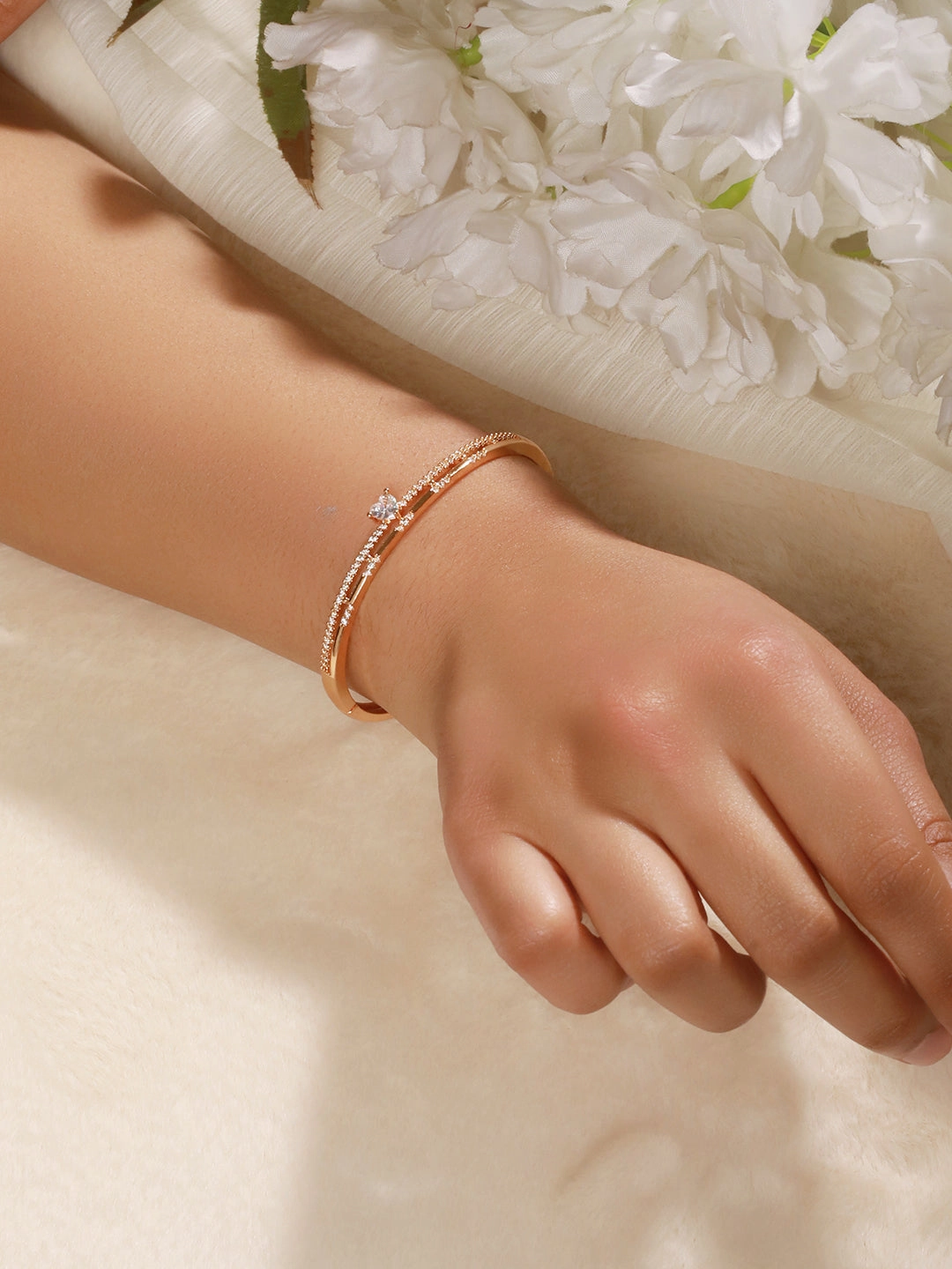 Jazz And Sizzle  Rose Gold-Plated Triangular Shaped AD studded Bangles type Bracelet