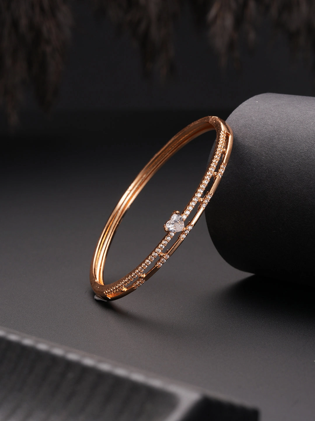 Jazz And Sizzle  Rose Gold-Plated Triangular Shaped AD studded Bangles type Bracelet