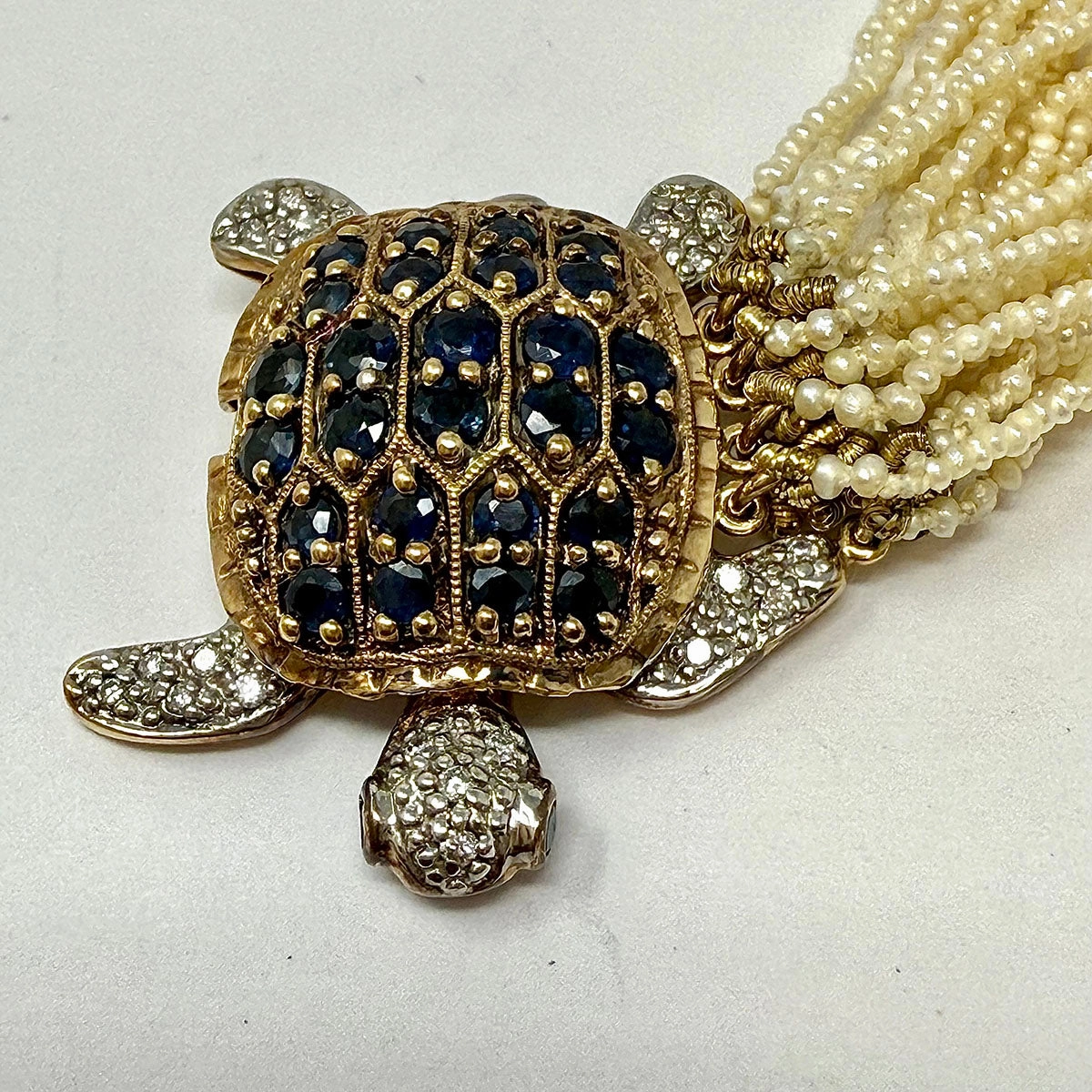 Multistrand Seed Pearl  Necklace with Tortoise Embellished Clasp