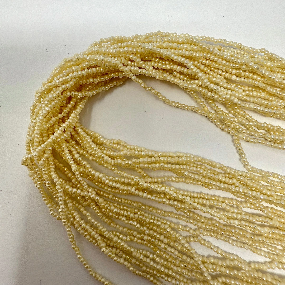 Multistrand Seed Pearl  Necklace with Tortoise Embellished Clasp