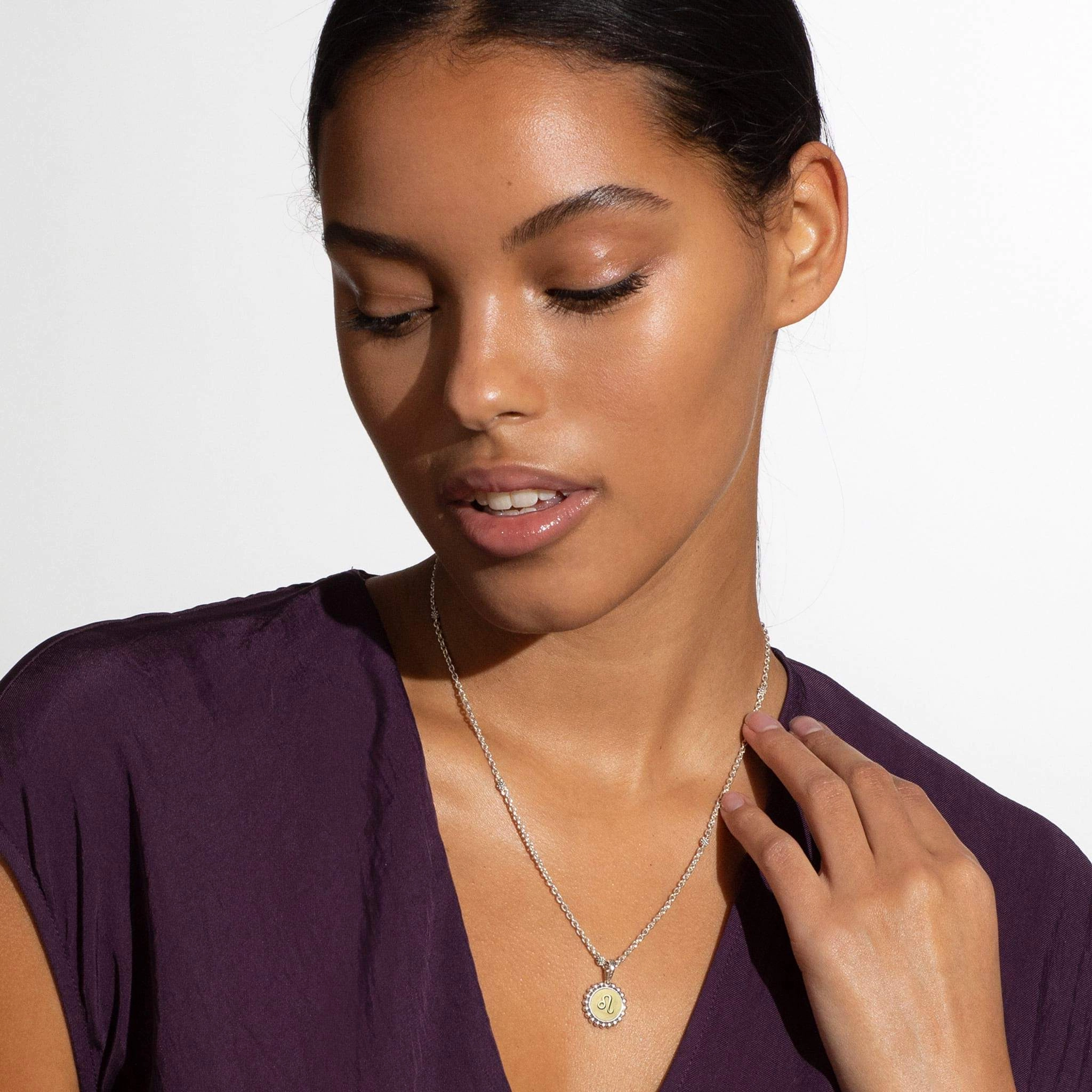 Signature Caviar Leo Zodiac Charm