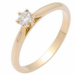 Solitaire en or jaune serti d'un diamant.