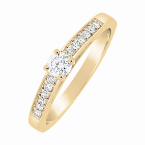 Solitaire en or jaune serti de diamants.