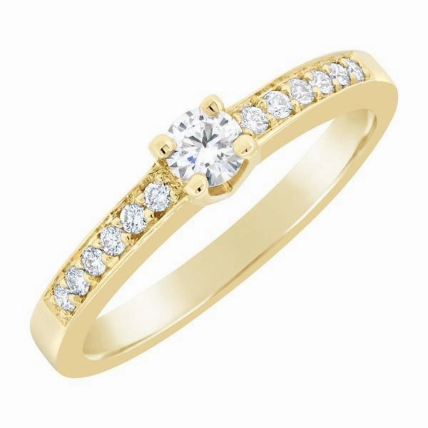 Solitaire en or jaune serti de diamants.