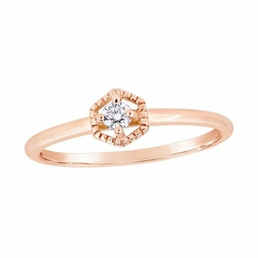 Solitaire en or rose serti d'un diamant.