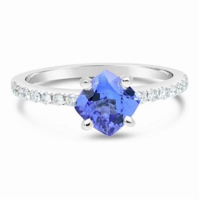 Solitaire or blanc serti d'un saphir et de diamants.