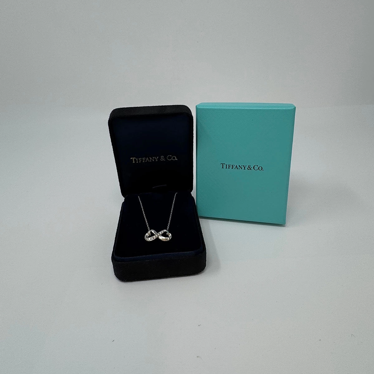 Tiffany & Co. 18K White Gold Diamond Infinity Loving Heart Pendant Necklace