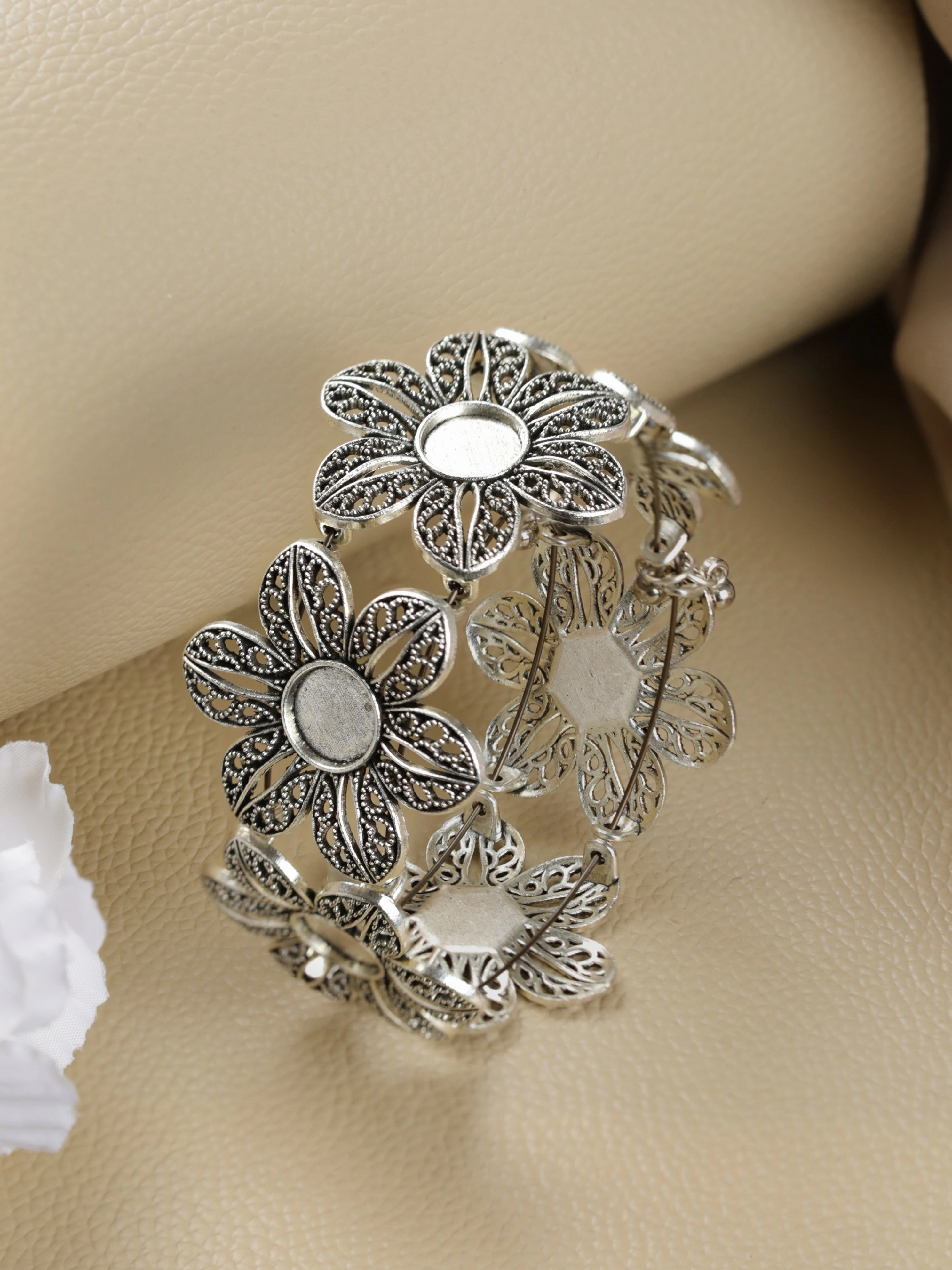 Women Silver-Plated & Floral Style Oxidised Bangle-Style Bracelet